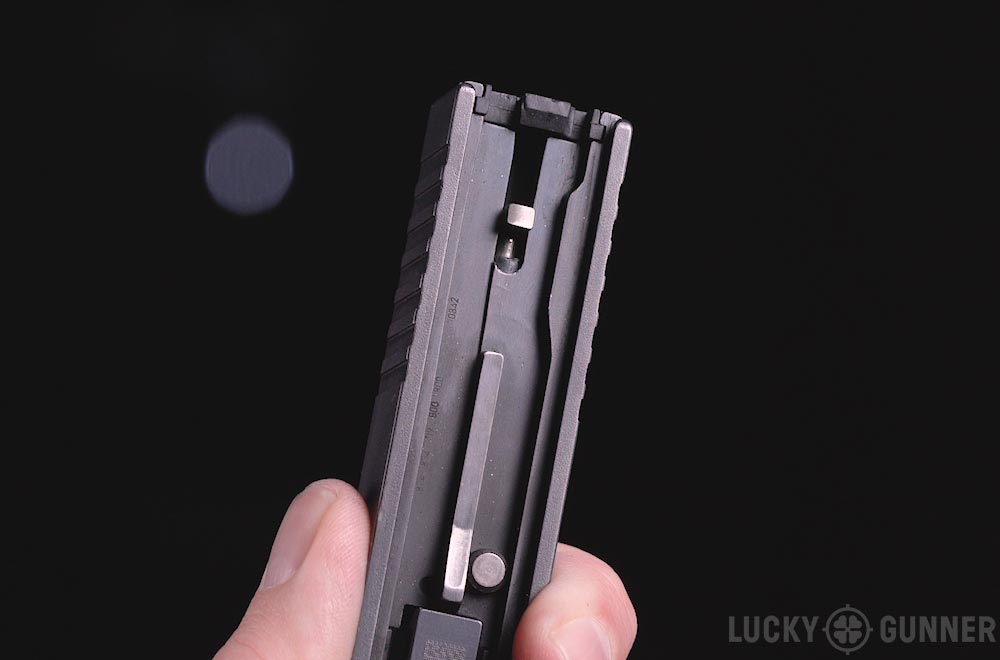 A glock slide with the standard cover plate